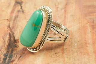 Genuine Pilot Mountain Turquoise set in Sterling Silver Ring. The Pilot Mountain Mine is located in Esmeralda County, Nevada. Created by Navajo Artist Freddy Charley. Signed by the artist.